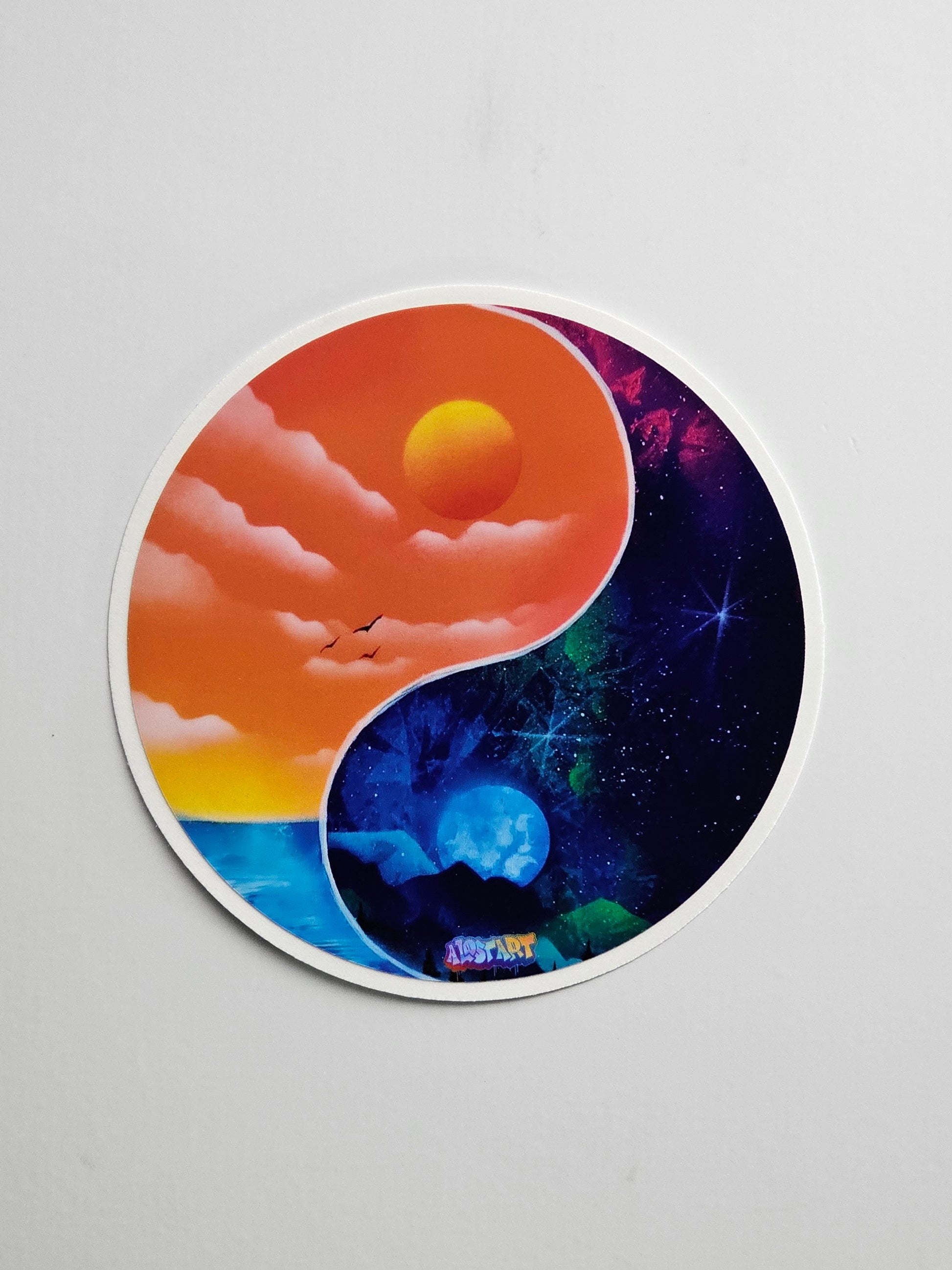 Yin yang design with sun and moon on a gray background