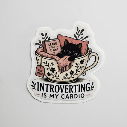 Die Cut Sticker Featuring a Cute Black Cat Sleeping in a Tea Cup